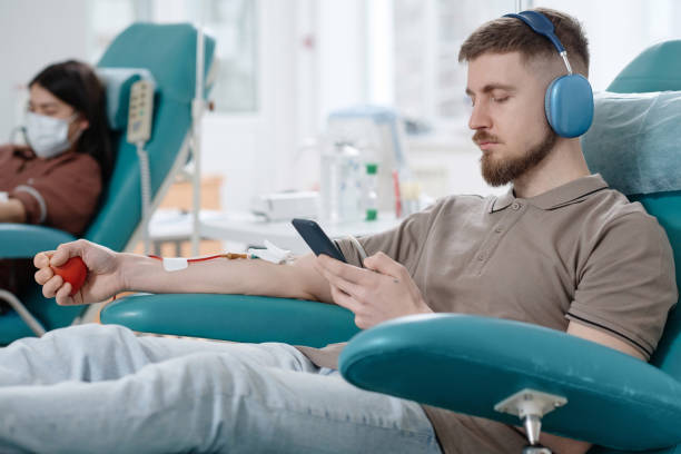 istock Young People Making Blood Donation in Hospital 1972079697