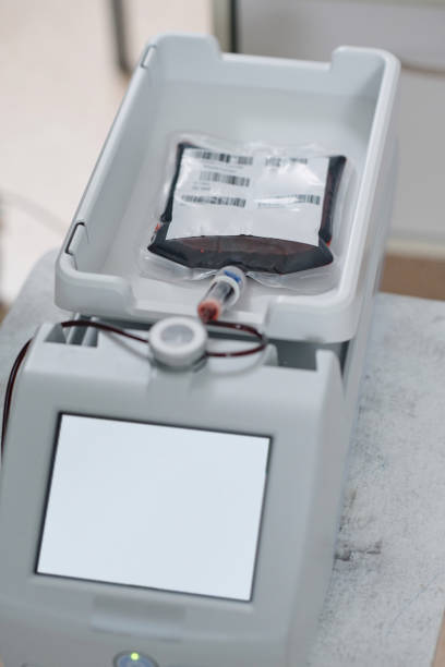 istock Blood Bag Put in Medical Mixing Machine 1972079942