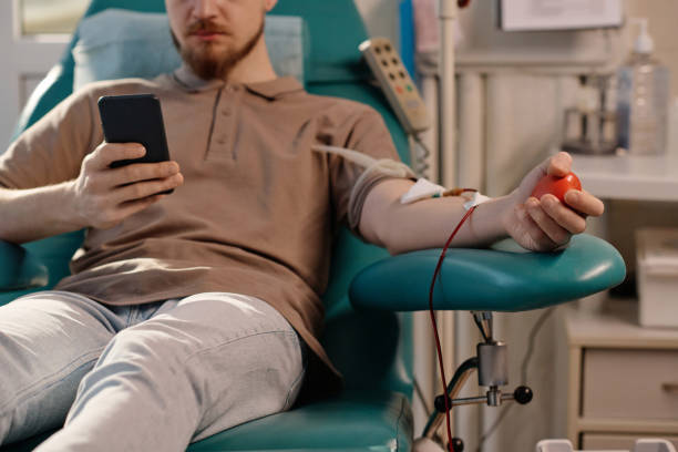 istock Young Caucasian Man Donating His Blood for People in Need 1972080771