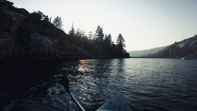 POV kayaking in a calm lake in Southwest USA