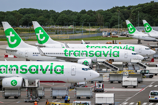 Transavia low-cost airline passenger planes on the tarmac of Eindhoven Airport. The Netherlands - June 29, 2020