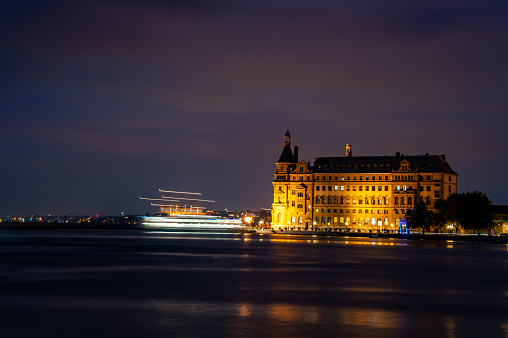 Haydarpaşa Train Station and the lights of the passenger ferry passing nearby