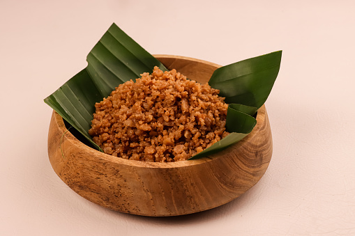 Blondo is the Dregs of Coconut Milk Which is Cooked Until it Releases Oil In The Form of Small Lumps.