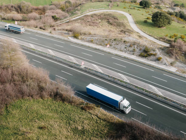 istock Truck on a highway from above 1972226597