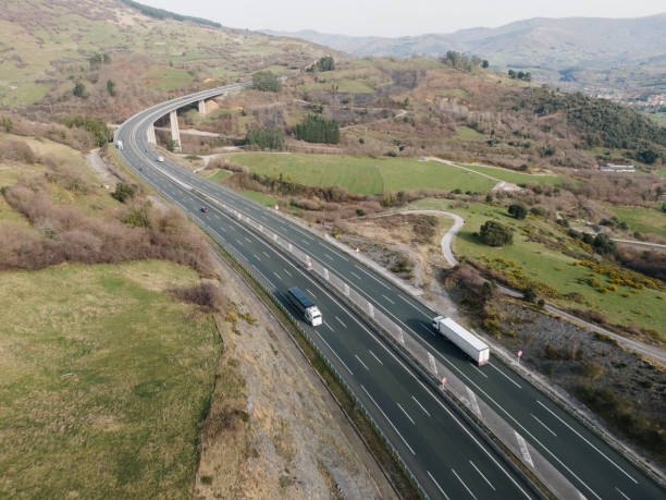 istock Highway in a rural area from above 1972228828