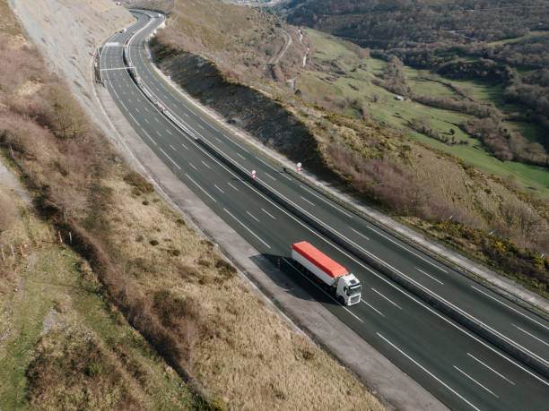 istock Truck on a highway from above 1972229357