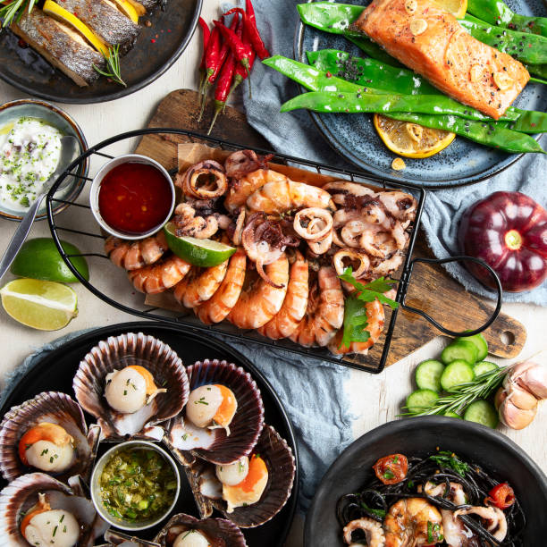 Assortment variousfish dishes - octopus, shrimp, crab, seafood, mussels, salmon.