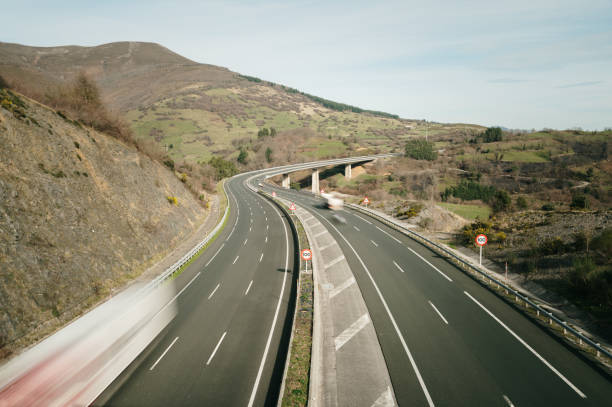istock Highway with traffic in motion 1972253766