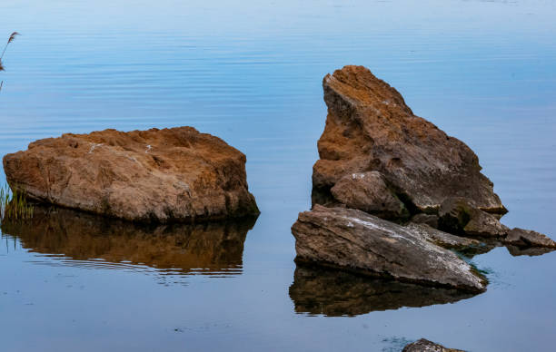 Free Stock Photo of Rocks Floating in Middle of Body of Water ...