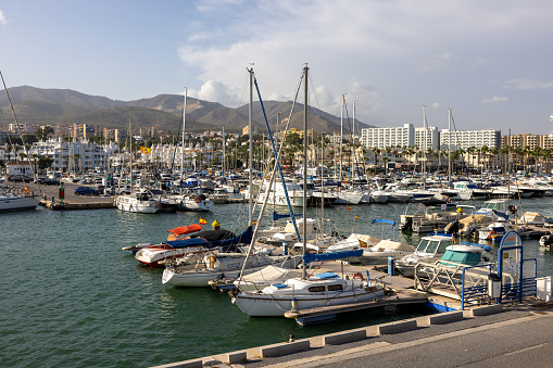Benalmadena, Spain - September 15, 2023: Boats and yachts moored at Puerto Marina in Benalmadena, Costa del Sol Malaga, Spain. This marina has berths for 1100 boat