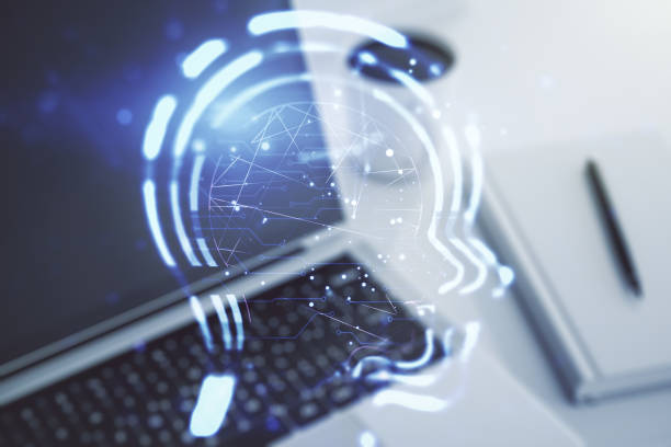 istock Creative artificial Intelligence concept with human head hologram on modern laptop background. Multiexposure 1972332161