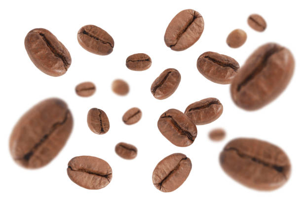 istock Coffee beans in the air close -up isolated on white background. 1972344507