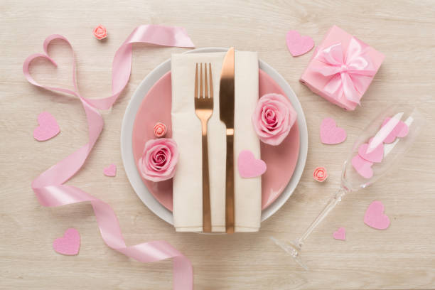 istock Festive table setting for Valentine's Day on wooden background, top view 1972358247