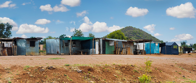 informal settlement, ghetto made out of corrugated iron sheets and wood, township like
