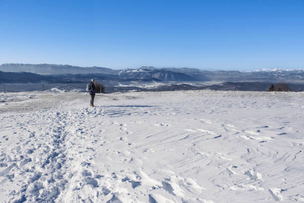 Young woman hiker showing you other possibilities for hiking in mountains