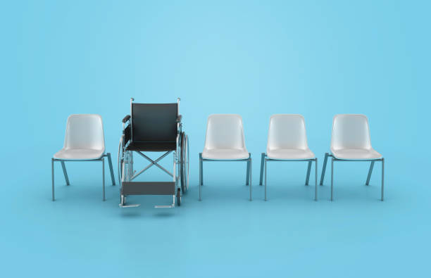 istock Wheelchair with Office Chairs 1972380250