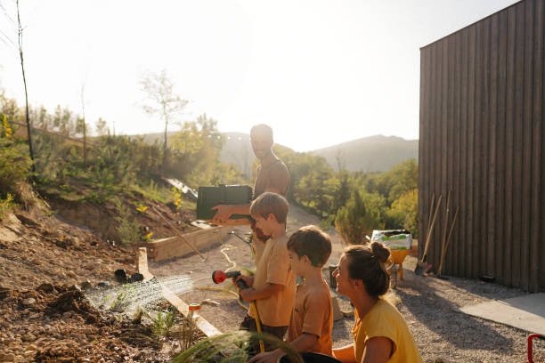 istock Landscaping our backyard together 1972380881