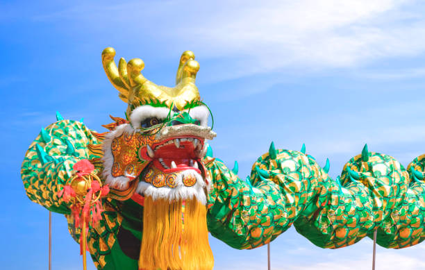 istock Beautiful Chinese dragon dance performances against blue sky background during Chinese New Year festival celebration 1972382065