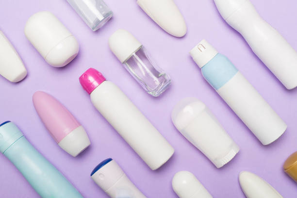 istock Many different deodorants on color background, top view 1972383983