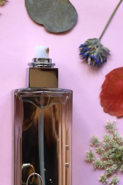 istock Perfume Bottle and Pressed Flowers 1972396550