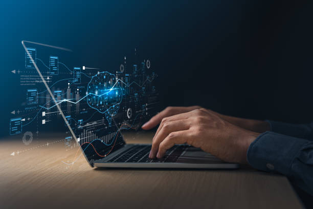 istock Businessman using laptop with digital screen about brain of AI and exponential graph. Digital information technology and artificial intelligence concept. 1972401891
