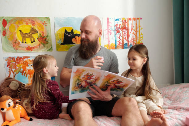 istock Man looking at one of his daughters 1972409951