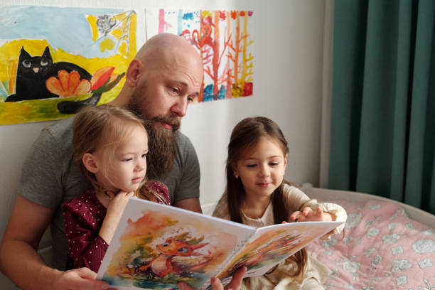 istock Discussing pictures in books of comics 1972409956