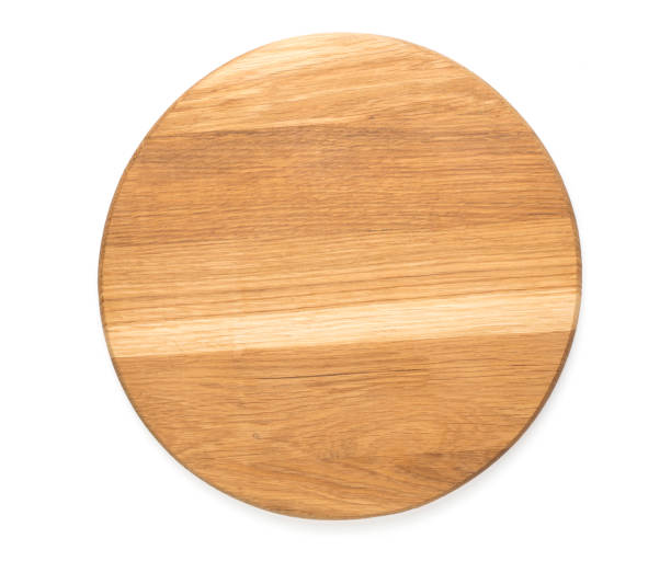 istock Wooden round board isoleted on white, top view 1972414794