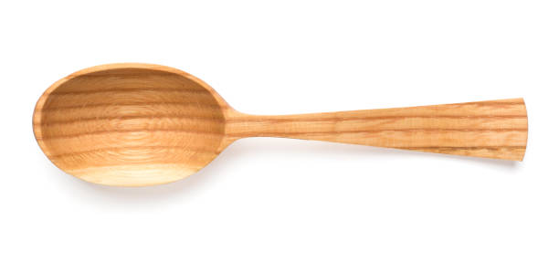 istock Empty wooden spoon isolated on white, top view 1972414796