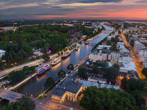 Aerial view of Aura river in downtown Turku, Finland, on a summer evening.
