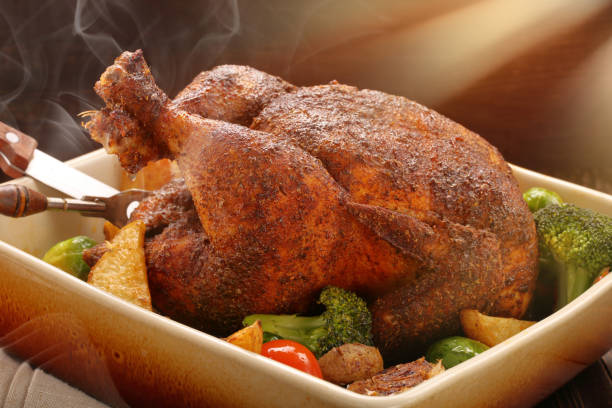 Roasted grilled chicken with vegetables in a ceramic bowl