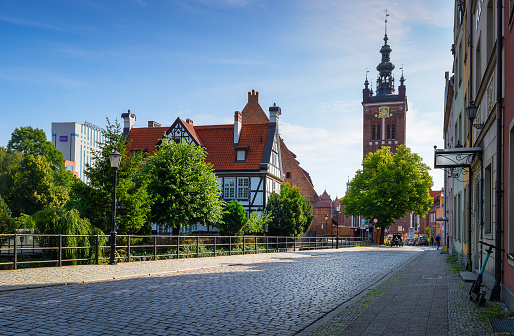 Gdansk, Poland - July 15, 2023: Beautiful architecture of the old town in Gdansk. Bright facades of buildings. View of the Old Town. A walk through the city on a sunny summer day