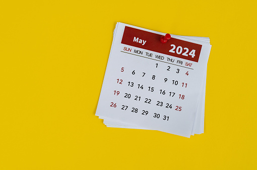 2024 May calendar on yellow background