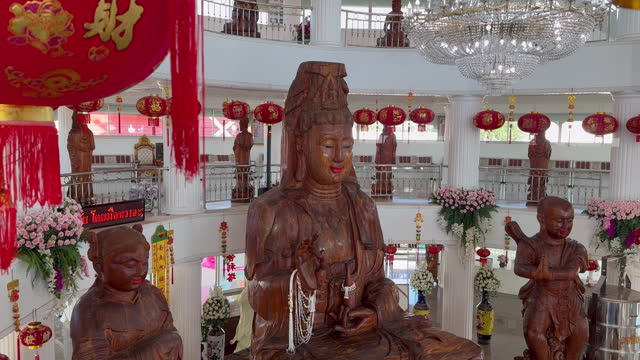 Large carved wooden goddess Kuan Yin