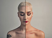 Woman, beauty and makeover with half face for comparison in studio with makeup, cosmetics and piercing. Model, before and after with red lipstick, skincare and transformation on beige background