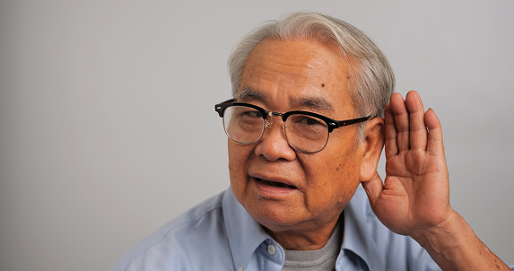 Asian old man couldn't hear the cause of his deafness.