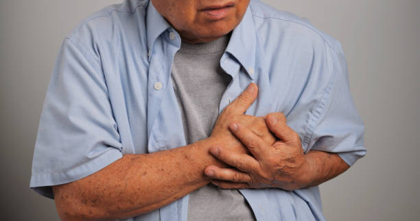 istock An elderly man is suffering from heart disease. Old Asian man having heart problems. 1972578577