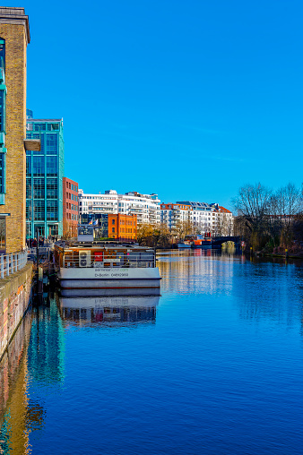 Berlin, Germany - January 28, 2024: Scene on the banks of the Spree on a sunny winter day.