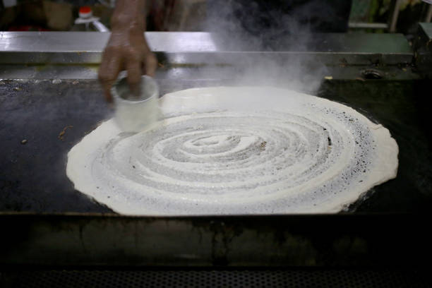The process of making thosai