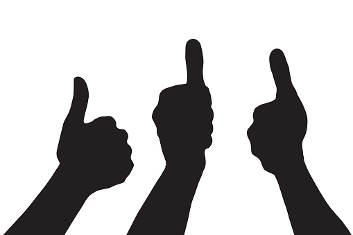 Three people give the thumbs-up sign in silhouette.