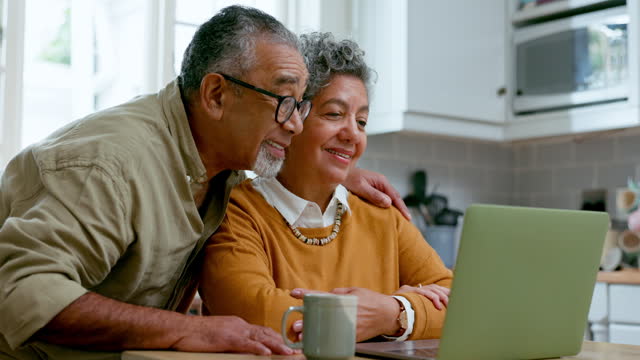 Elderly couple, video call and laptop conversation in home for internet connection, communication or speaking. Old people, retirement and happy together for online web chat,  virtual talk or love