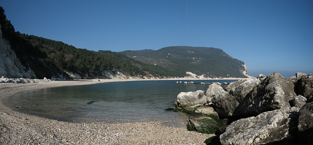 rocks in sea abd sand beach, long exposure shoot