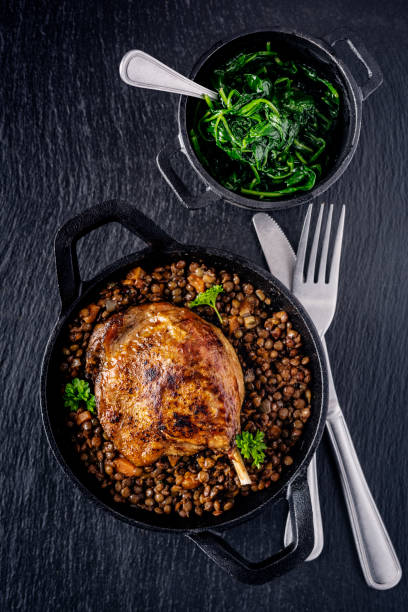 istock Duck Confit with Puy Lentils and Spinach 1972707641