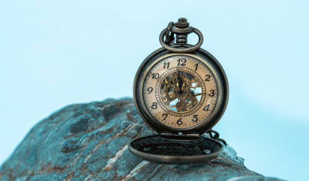 Close-up pocket watch on the rock