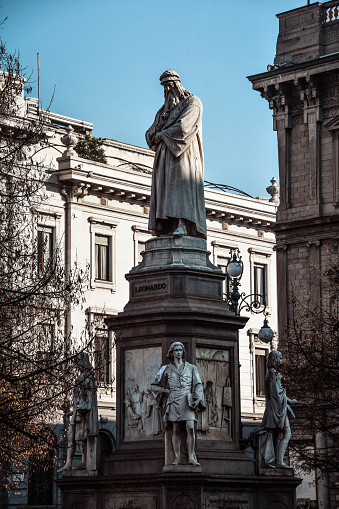 Side View Of Leonardo Da Vinci Monument At Piazza Della Scala In Milan, Italy