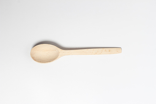 Beautiful bright wooden spoons for food and spices.