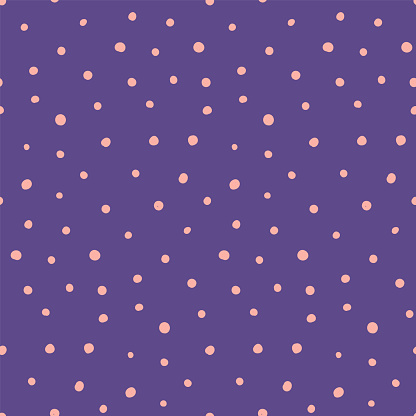 Small dots simple seamless geometric pattern, pink on violet background. Hand drawn vector illustration. Childish texture. Design concept for kids fashion print, textile, fabric, wallpaper, packaging.