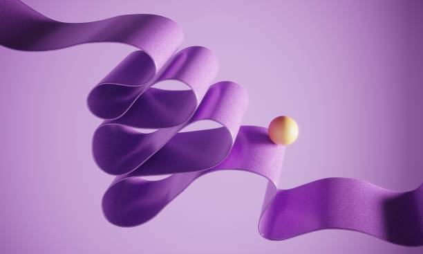 istock Orange colored ball standing on twisted ribbon 1972792407