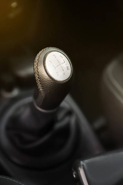 istock black interior of a modern car. Dashboard. Luxury leather steering wheel. Auto controls. Car doors inside. Car chairs and seats. Car sofa. Back and front row. Interior and door trim. High quality 1972798829