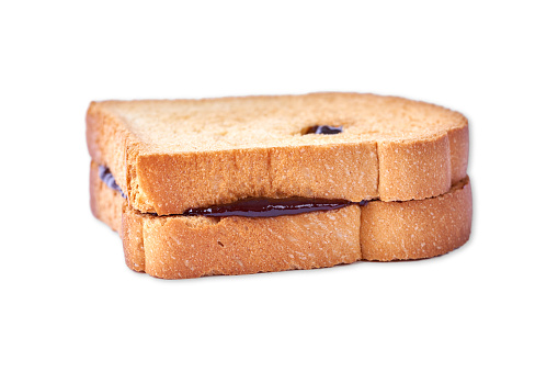 Toast with plum jam on the white background.